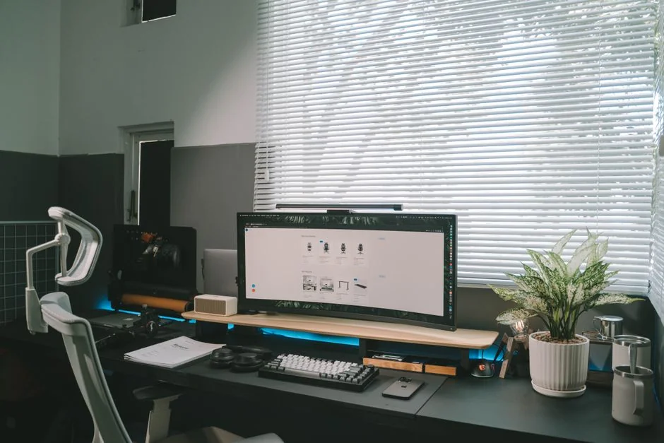 A person using a laptop to browse stock photo websites. Freelancing work in a cozy setting.